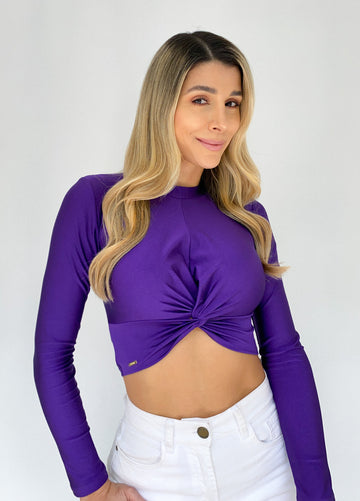 Blusa unicolor manga larga cruzada