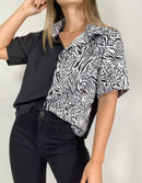 Blusa camisera dos tonos animal print