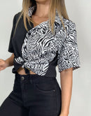 Blusa camisera dos tonos animal print