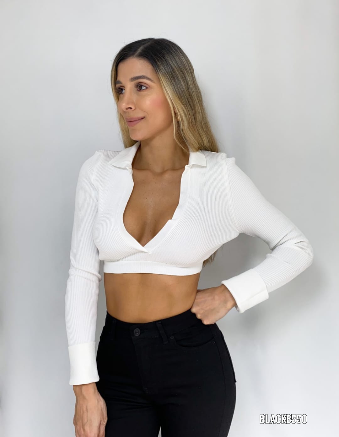 Blusa manga larga rib escote en v