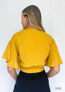 Blusa corta nudo en el centro