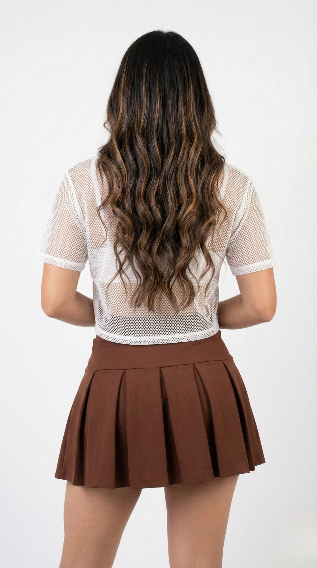 Falda Corta Con Pliegues