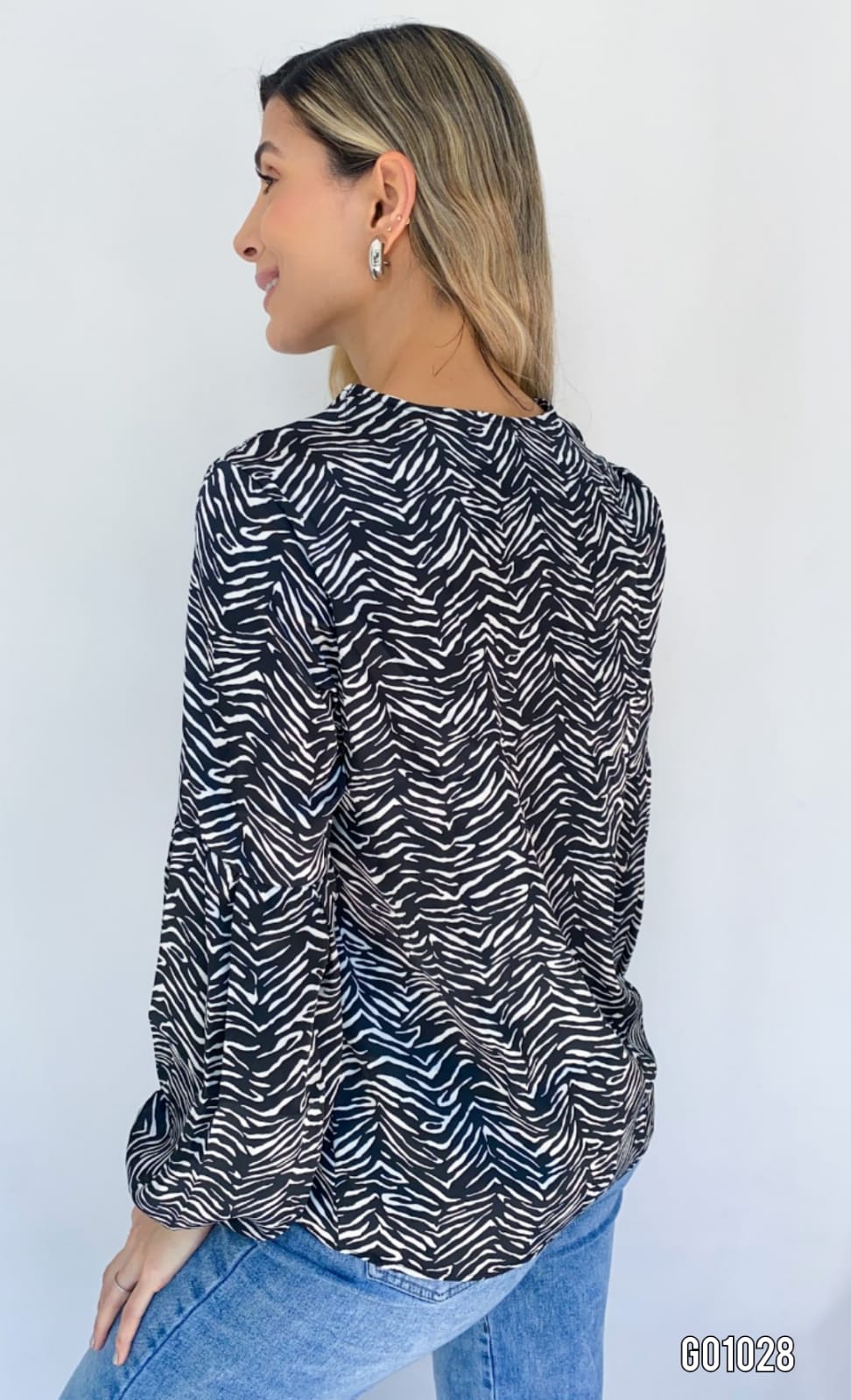 Blusa manga larga cruzado escote animal print