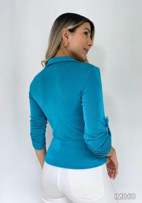 Blusa manga escote cruzado bolsillo izquierdo