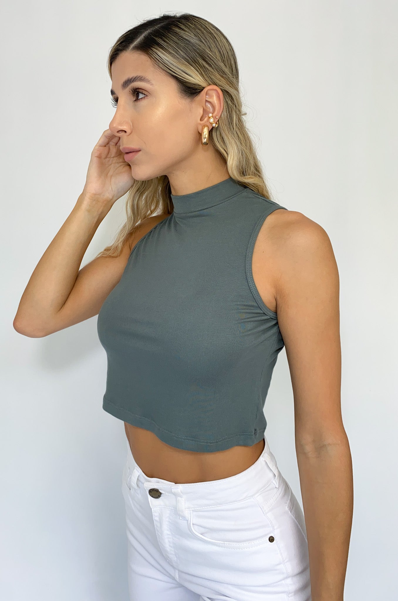 Blusa cuello alto manga sisa