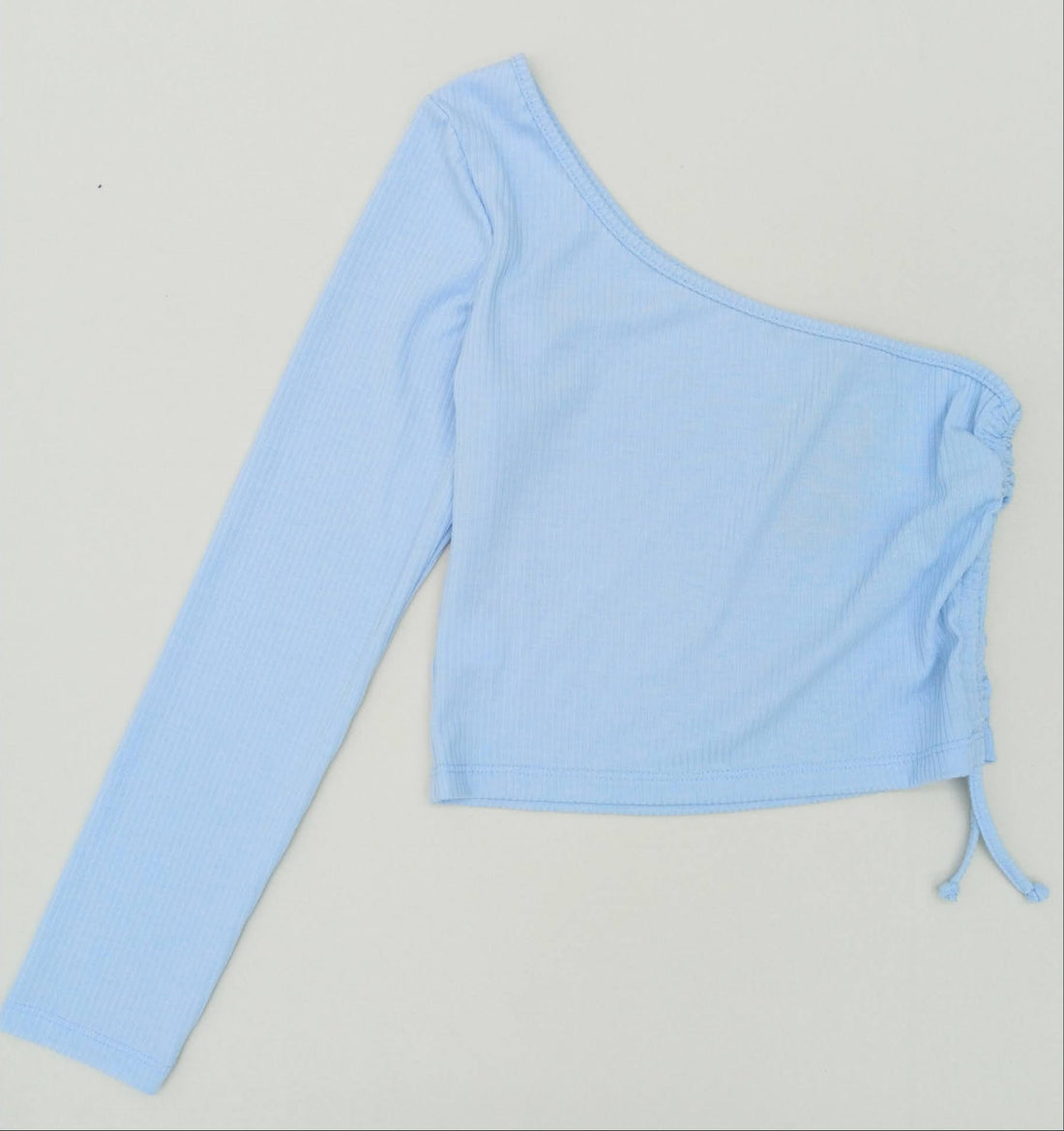 Blusa Rib Asimetrica Runcho Costado