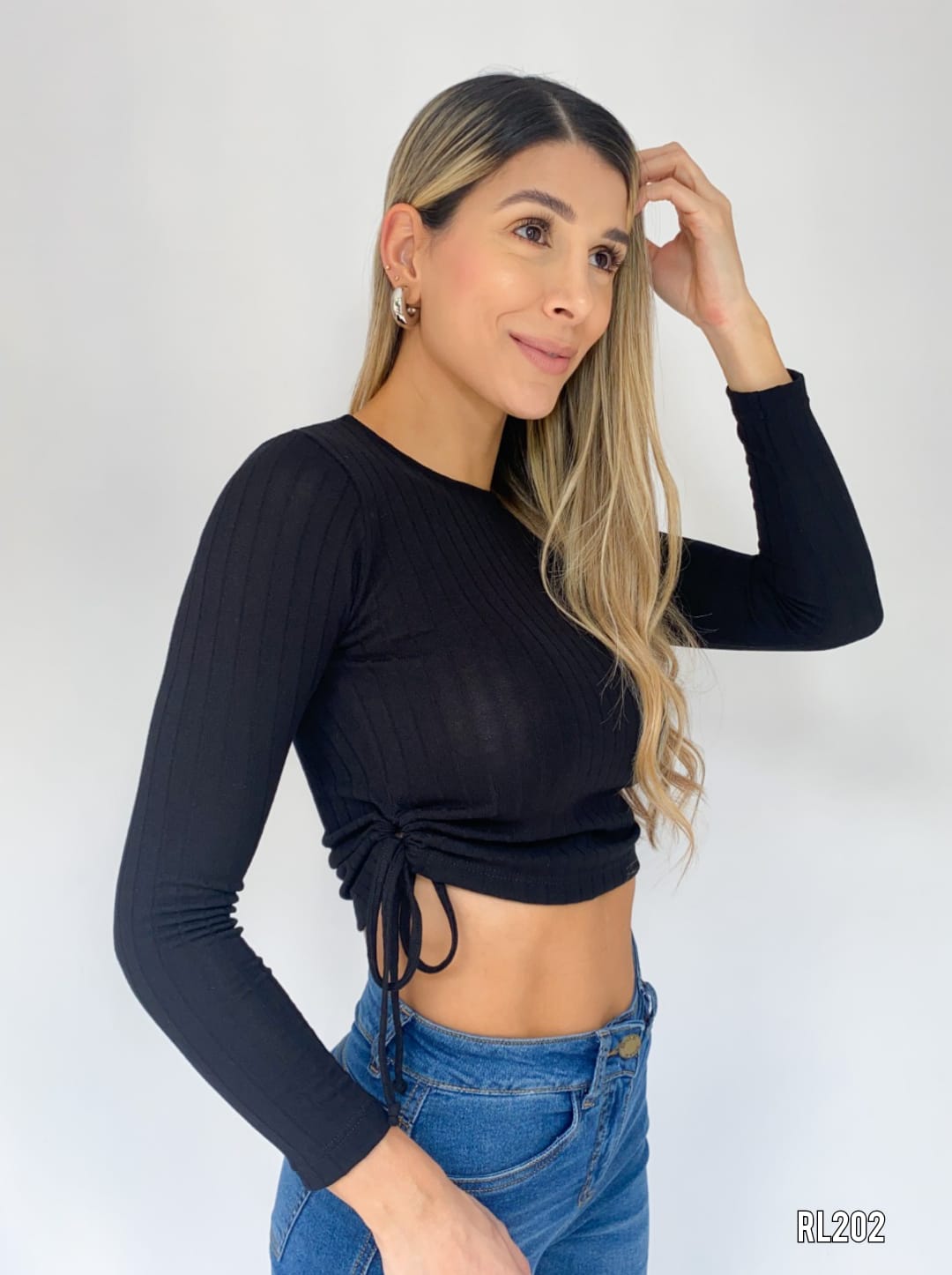 Blusa Manga Larga Zurcida Lados