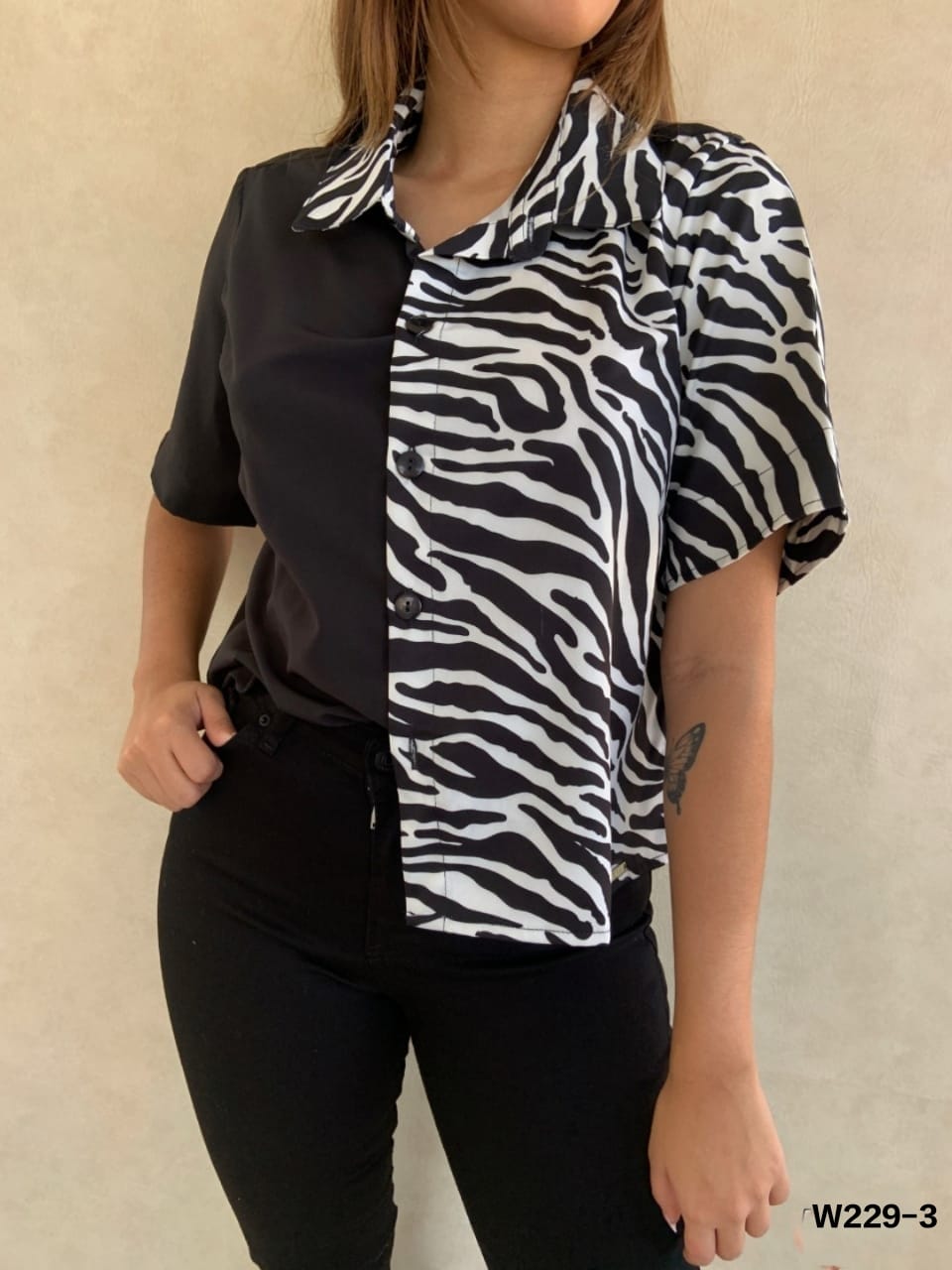 Blusa camisera dos tonos animal print