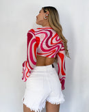 Blusa corta manga larga amarre delantero