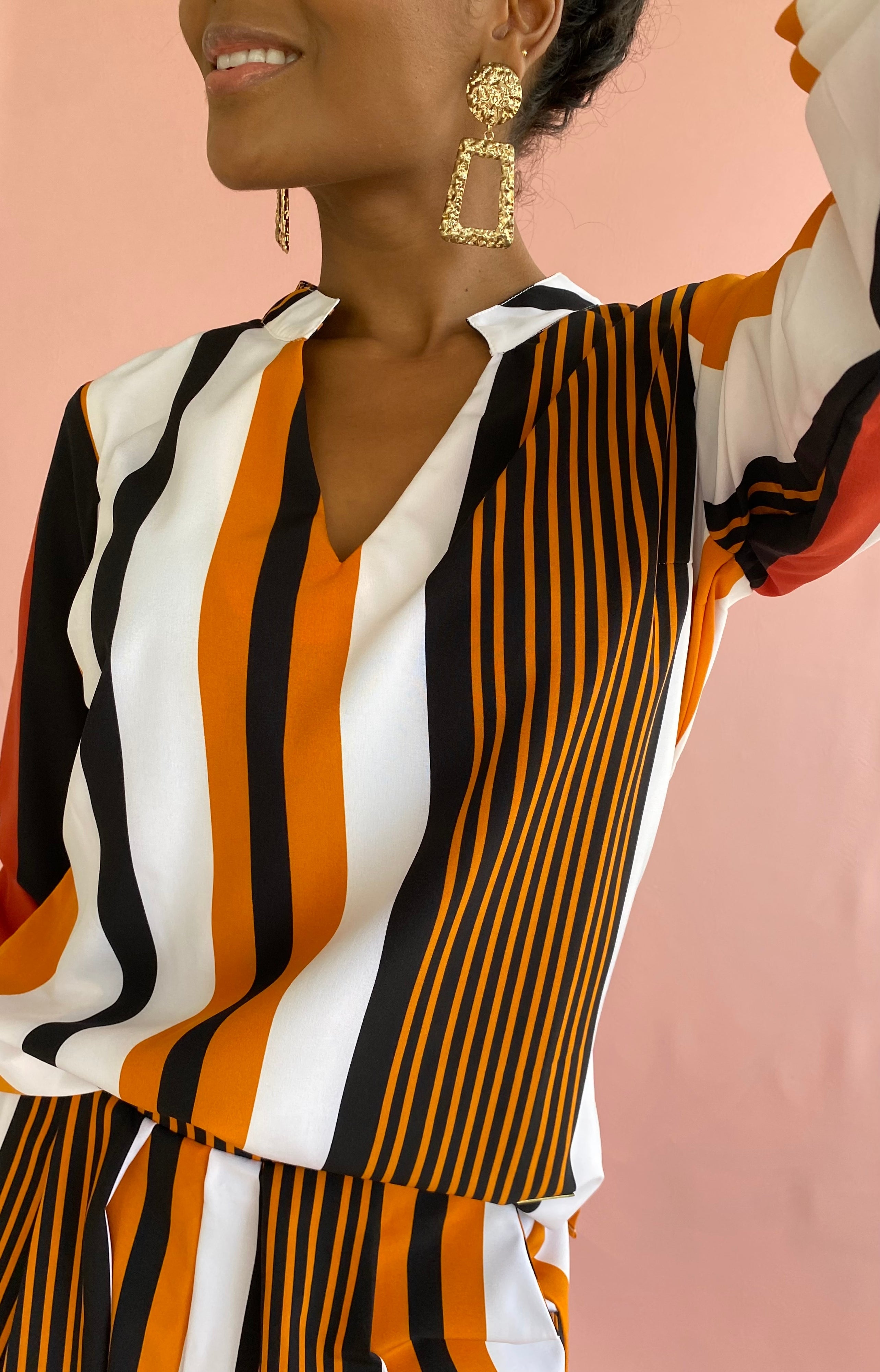 Blusa manga larga rayas cuello v