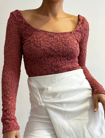 Blusa blonda manga larga cuello redondo